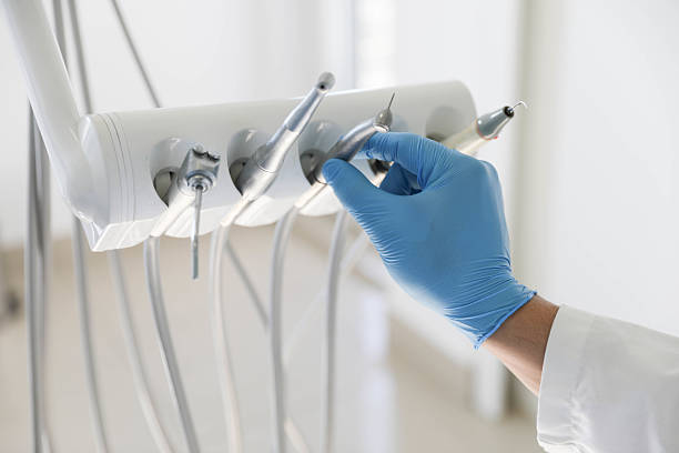 Professional Root Canal Treatment technician working in Rice Lake, WI